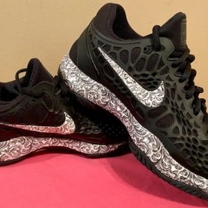 Nike Zoom Cage 3- women's 7